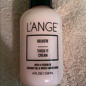 Lange thick it cream. Makes hair luxurious & thick